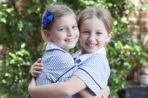 McAuley Catholic Primary School Rose Bay - students hugging each other